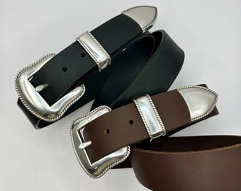 May include: Three leather belts with silver buckles. One is black, the others brown. The buckles have a decorative rope trim. The belts are displayed against a white background.