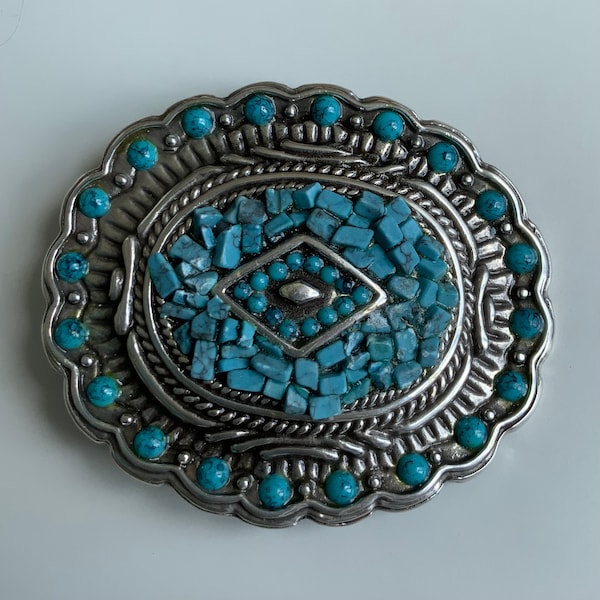 Southwestern Belt Buckle with Genuine Turquoise Chips and Faux Turquoise Stones. Scalloped Border Rope Accents. Antique Nickel Plating