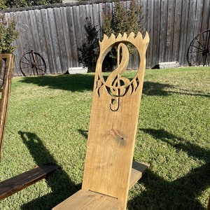 Viking Chair with Treble Clef design. Handcrafted from pine wood with light stain and semi gloss polyurethane finish.