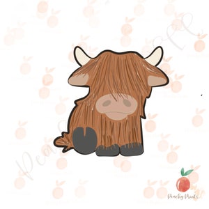 May include: A brown and white cartoon Highland cow with a fluffy coat sitting on a white background.