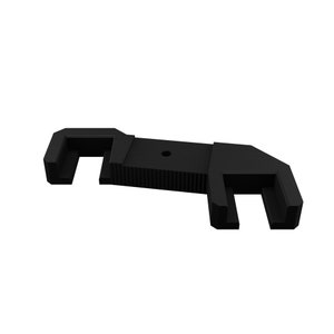 May include: Black plastic camera accessory with two slots and a threaded hole in the centre.