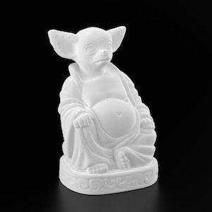 May include: White ceramic figurine of a chihuahua dressed as a Buddha. The figurine is sitting in a meditative pose with its hands clasped in front of its chest.