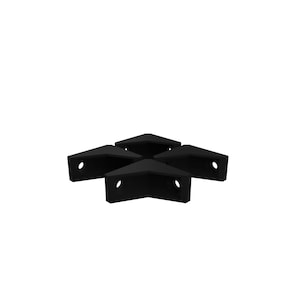 May include: Four black corner protectors, each with a rounded edge and a hole in the center. These protectors are designed to prevent damage to furniture and walls.