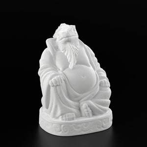 May include: White ceramic figurine of a smiling, round-bellied Buddha with a reptilian head and a beard. The Buddha is sitting cross-legged on a base with a decorative design.