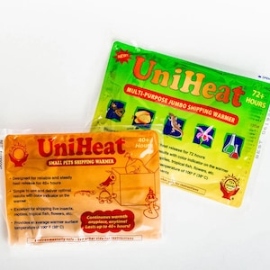 May include: Two UniHeat shipping warmers are displayed. One is orange and labeled "SMALL PETS SHIPPING WARMER" and the other is green and labeled "MULTI-PURPOSE JUMBO SHIPPING WARMER". Both are designed to provide heat for up to 72 hours.