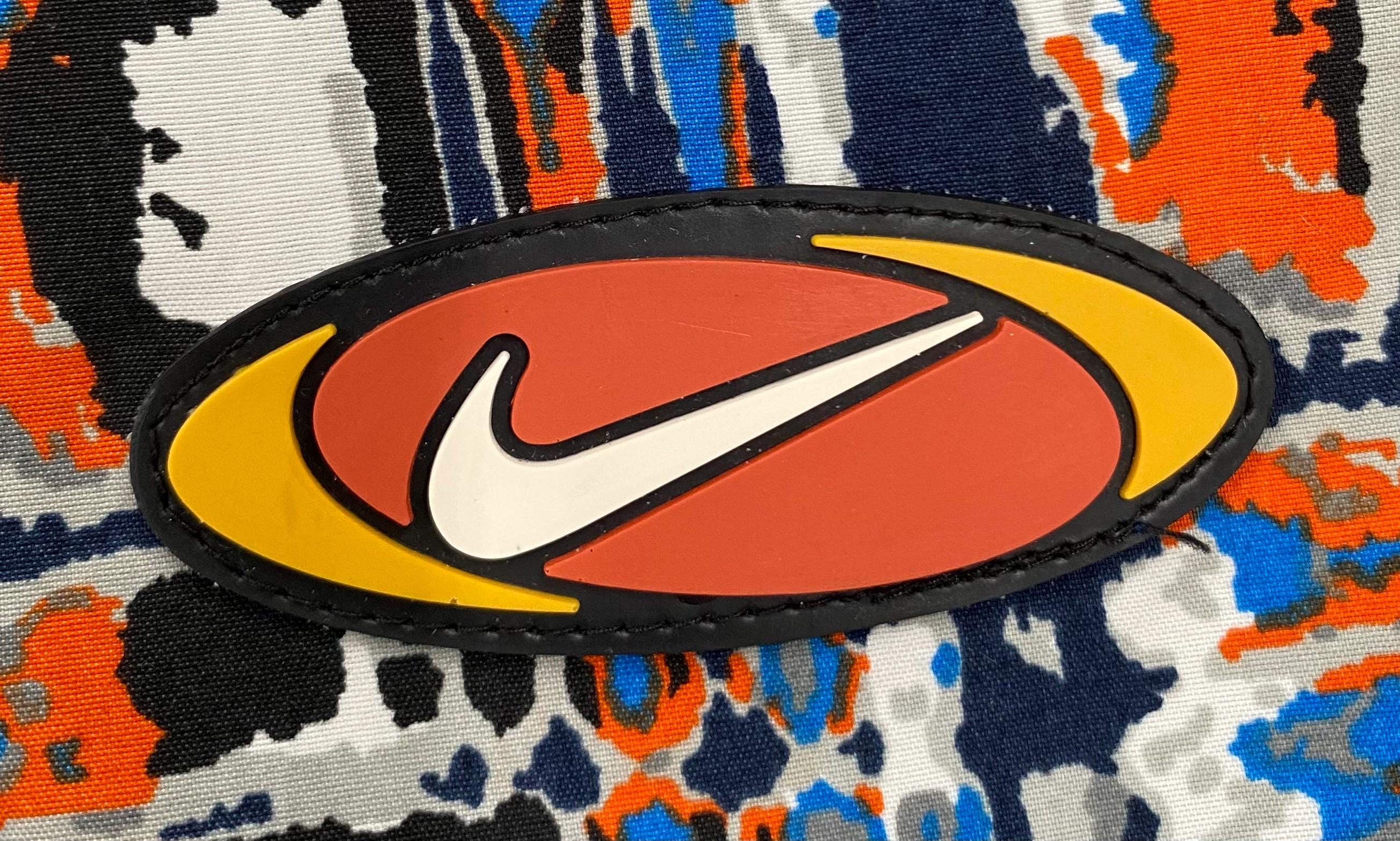 VTG 90's Nike White Tag Colorful Patterned Rubber Swoosh Shorts