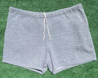 Pantaloncini di felpa grigi Russell Athletic vintage anni '90 con tasca da uomo di grandi dimensioni, realizzati negli Stati Uniti