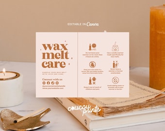 May include: A beige card with brown text reading "wax melt care" and care instructions. The card is on a stack of books with a lit candle and a gold-colored match holder. The text includes safety tips.