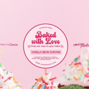 May include: A circular pink label design featuring the text Baked with Love, from our oven to your heart, and Vanilla Bean Cupcake. The label includes a list of ingredients, a placeholder for a business name, and a website URL on a pink background.