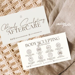 May include: Two cream-colored business cards with the text "Body Sculpting Aftercare" in elegant script. One card includes aftercare instructions with icons. The background is a woven texture and a beige fabric.