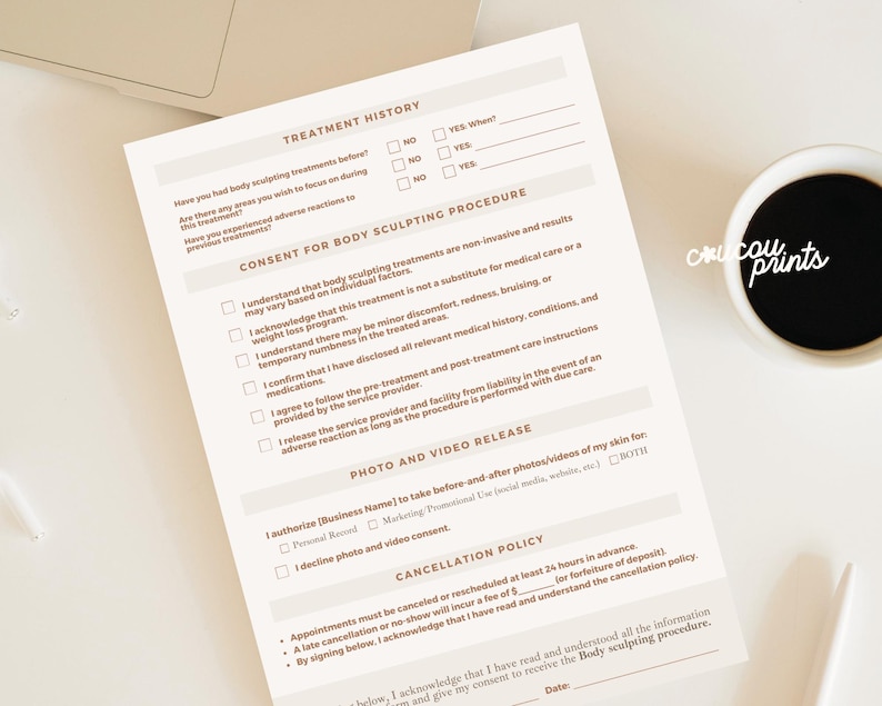 May include: A cream-colored body sculpting consent form with headings like "Treatment History" and "Consent for Body Sculpting Procedure." A cup of coffee and a pen are next to the form. The words "crucou prints" are on the cup.