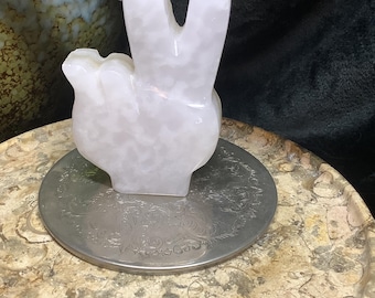 UV-reactive Pink  Mangano Calcite carved hand, piece sign