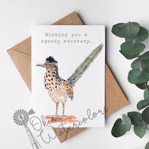 Puede incluir: Una tarjeta de felicitaci&oacute;n con una ilustraci&oacute;n de acuarela de un correcaminos. La tarjeta dice "Wishing you a speedy recovery."