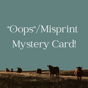 May include: A silhouette of a herd of brown cows grazing in a field with a blue sky and the text "Oops"/Misprint Mystery Card!" in white.