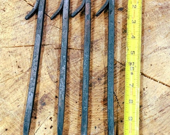 Rustic hand forged tent stake set