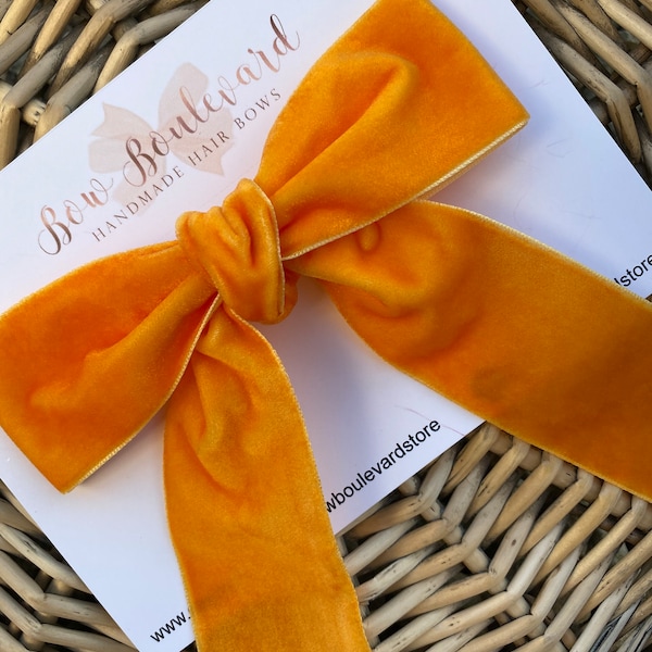 Tangerine velvet bow