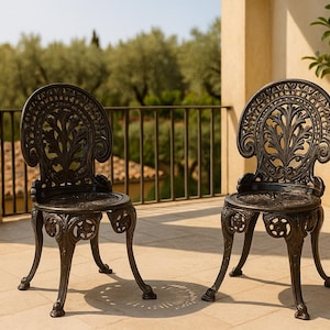 Two Antique Cast Iron Baroque Chairs (very heavy)