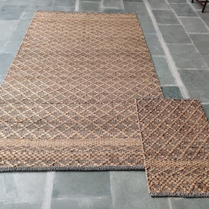 Alfombra de tejido plano Durrie de yute con red de diamantes entrecruzada (reducida a transparente)