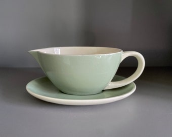 Poole Pottery sauce / gravy boat and stand in the Cameo Celadon green colour way, vintage 1960s Poole tableware - 17cm long