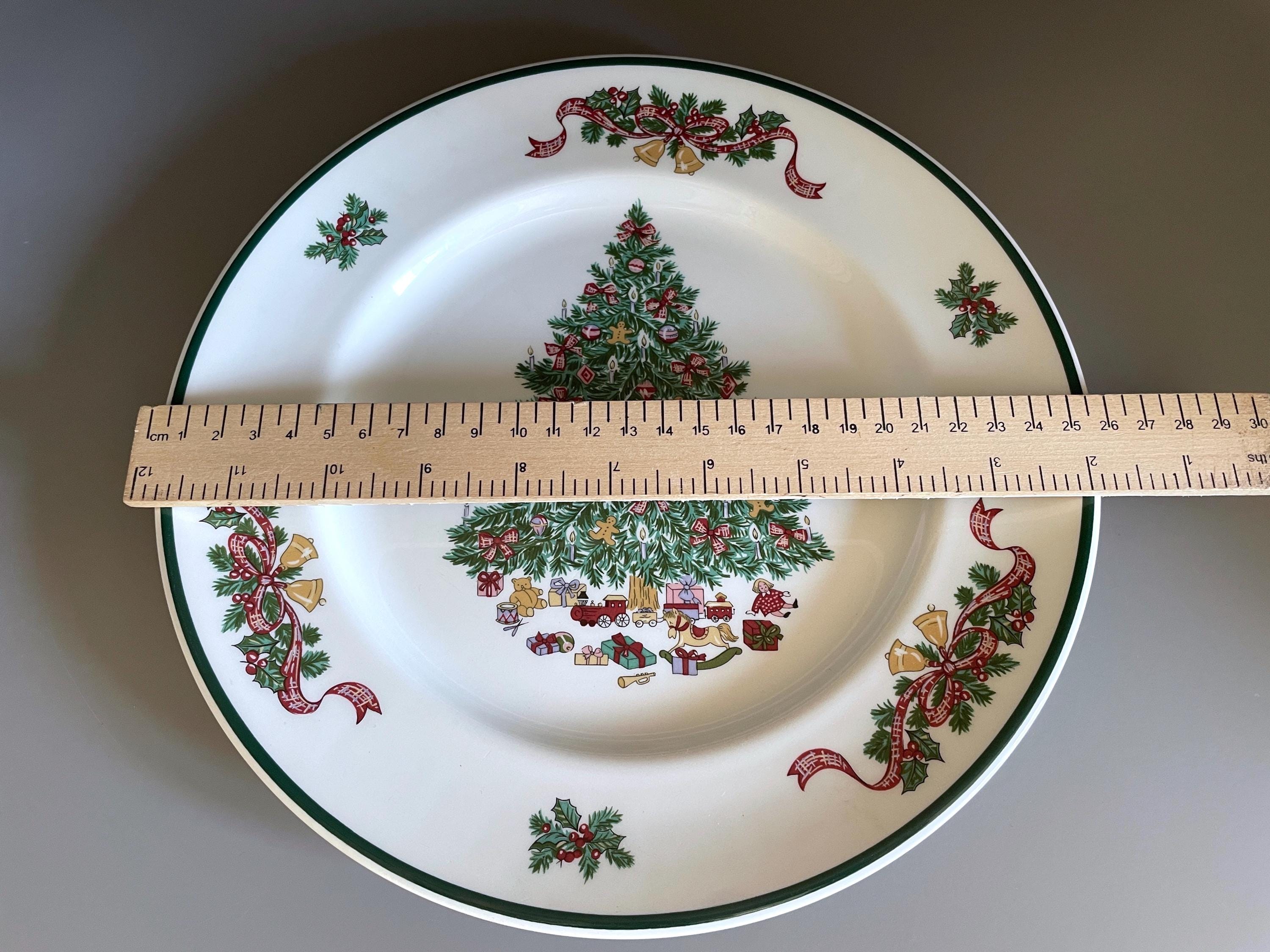 Johnson Bros Victorian Christmas dinner plate decorated with a traditional Christmas tree, toys and presents, c.1990s - 10.25"