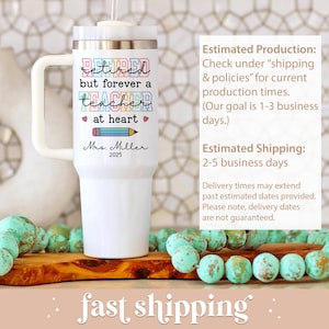 May include: White insulated tumbler with a handle, featuring the text "retired but forever a teacher at heart." Includes a pencil graphic and the name "Mrs. Miller 2025." The tumbler has a white lid and a straw.