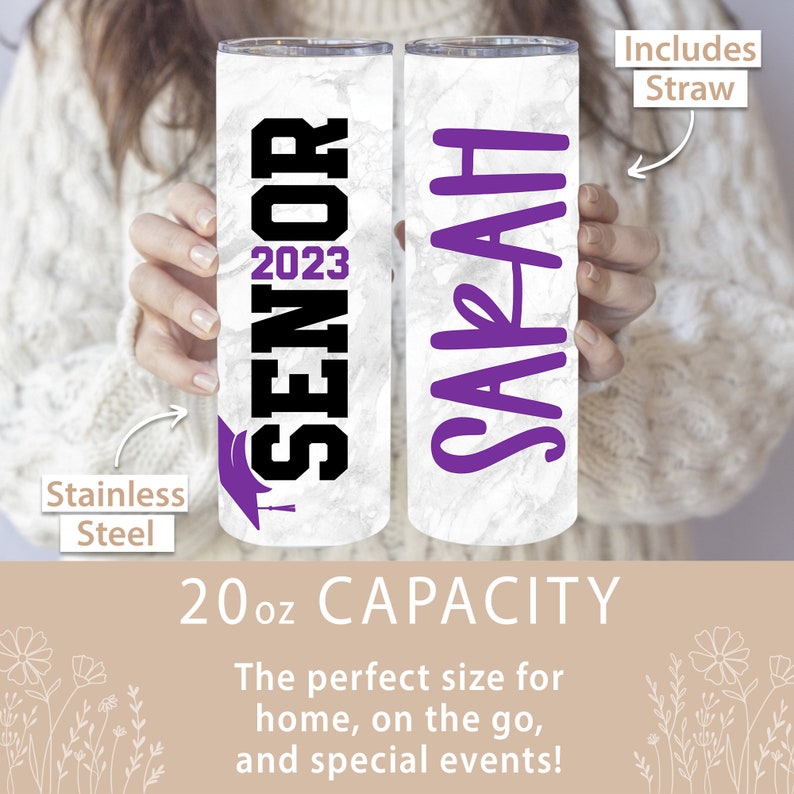 May include: Two 20 ounce stainless steel tumblers with marble-like designs. One tumbler has the text "Senior 2023" in black with a purple graduation cap. The other tumbler has the name "Sarah" in purple. Both tumblers include a straw.