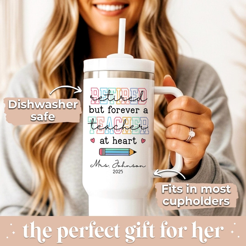 May include: White travel mug with a handle and a straw, featuring the text "Retired but forever a teacher at heart." Includes a pencil graphic and the name "Mrs. Johnson 2025." The mug is dishwasher safe and fits in most cupholders.