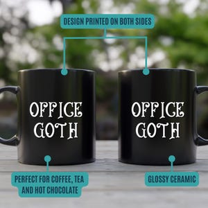 May include: Two black ceramic mugs with the words "OFFICE GOTH" in white script. The mugs are glossy and have a handle on the side. The text "DESIGN PRINTED ON BOTH SIDES" is above the mugs. The text "PERFECT FOR COFFEE, TEA AND HOT CHOCOLATE" is below the mugs.