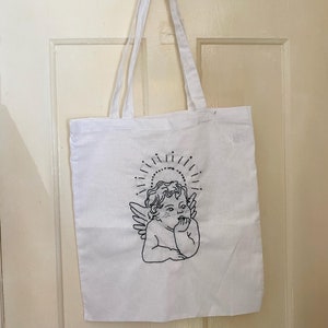 Handgestickte weiße Cherub-Tote