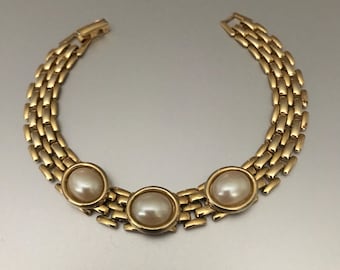 Pulsera vintage Panther Link con cabujón de perla y baño de oro