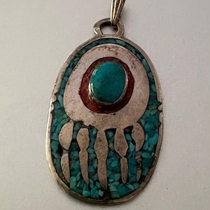 Vintage Navajo grävlingtass/björnklo hänge i sterlingsilver i turkos.