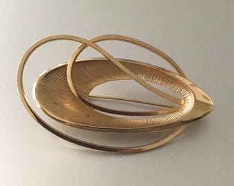 Broche vintage Emmons firmado, elíptico, de la era espacial atómica, tono dorado.
