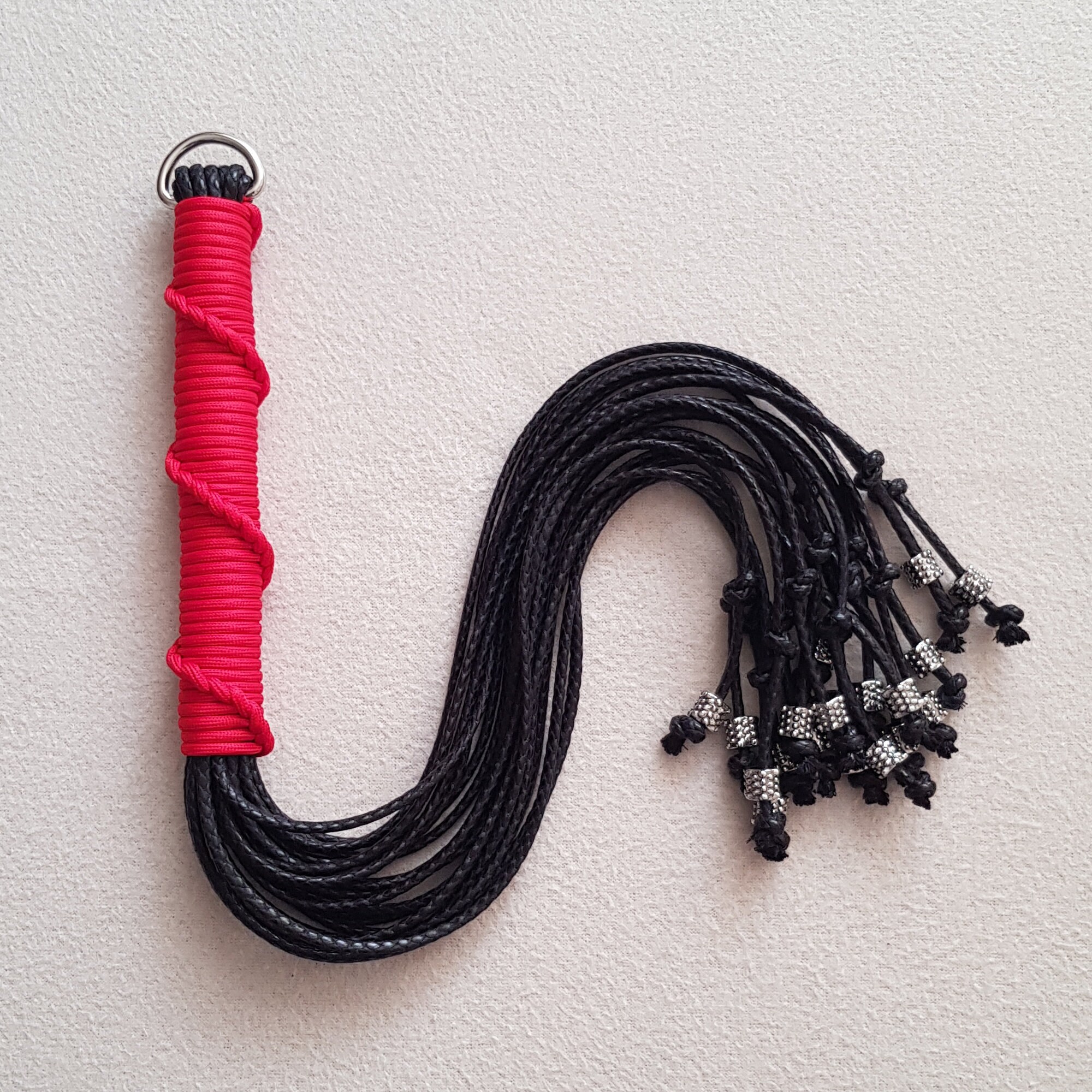 Paracord and waxed rope flogger Etsy