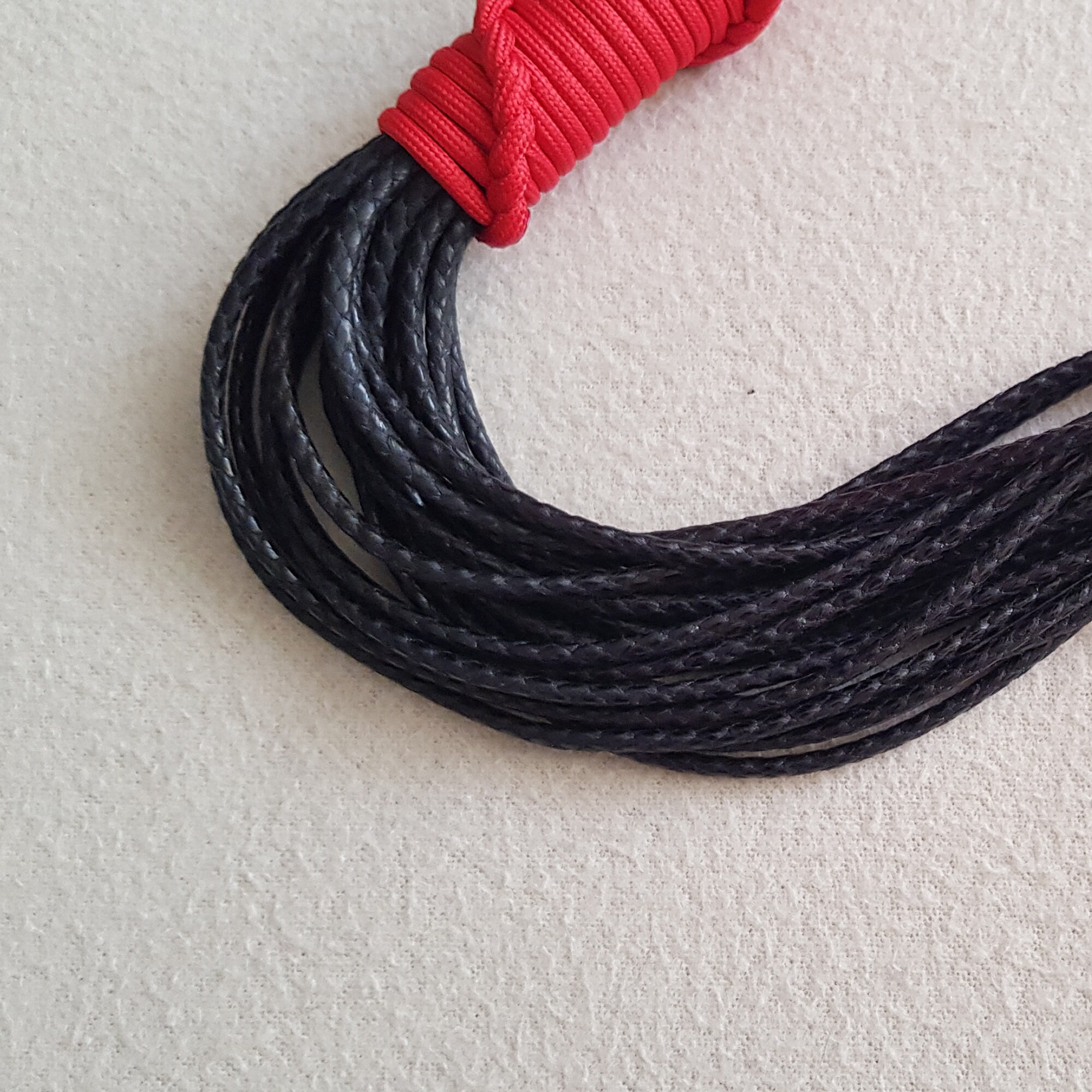Paracord and waxed rope flogger Etsy