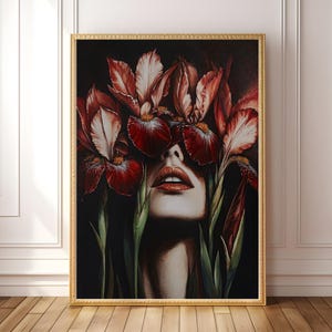 A bold and moody digital art print featuring a mysterious woman adorned with deep red irises. This gothic botanical portrait combines dark feminine energy with rich, luxurious tones — perfect for lovers of dramatic decor and modern romantic art.
Instant digital download for easy and stylish wall decor.