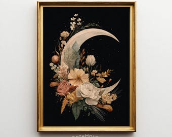 May include: A framed art print featuring a crescent moon design with a floral arrangement. The artwork showcases a gold frame, a black background, and a moon shape filled with flowers in shades of pink, peach, and cream. The text "GOTHHouse printery" is at the bottom.