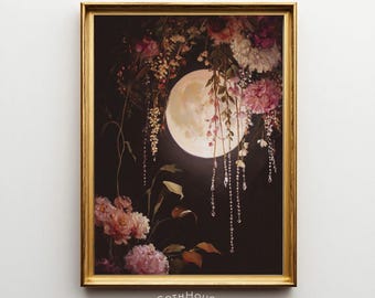 May include: A framed art print featuring a full moon and floral arrangement in shades of pink, white, and purple against a dark background. The print is in a gold frame, with the text "GOTH HOUSE printery" at the bottom.