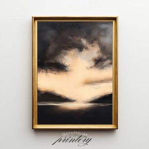 May include: Abstract landscape painting in a gold frame. The artwork features a dark, moody sky with a bright, glowing center, and a dark foreground suggesting a body of water. The text "GOTH HOUSE printery" is at the bottom.