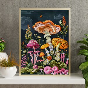 May include: Embroidered artwork featuring a variety of colorful mushrooms on a dark background. The mushrooms are arranged in a cluster, with some overlapping. The artwork is framed in a gold frame.