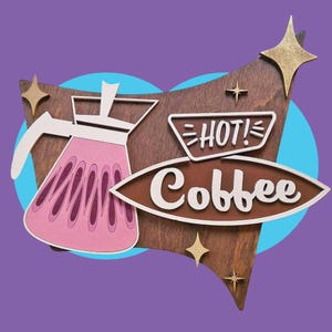 May include: Wooden coffee-themed wall art with a retro design. Features a pink coffee pot, the word "Coffee" in a retro font, and the word "HOT!" in a white frame. The background is a mix of brown, gold, and purple.