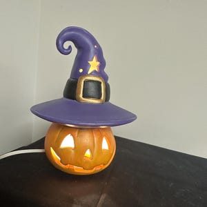 Halloween pumpkin with hat and clip light