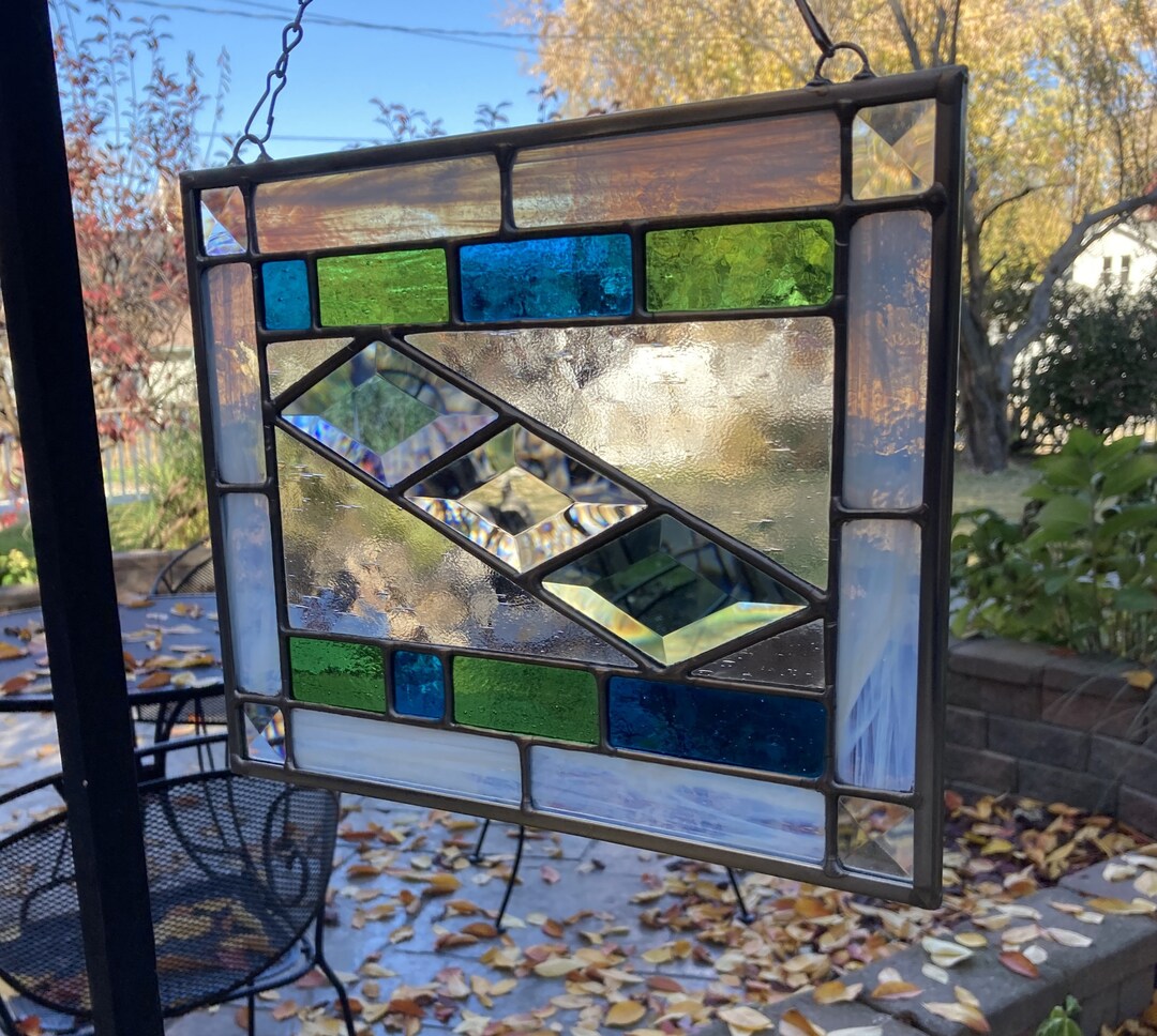 Stained Glass Rectangular Panel With Diamondshaped Beveled Glass. It is Visually Captivating