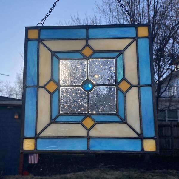 Stained glass square hanging panel, embodies the classic elegance of the Art Deco era.