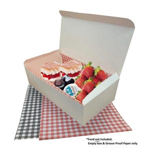 May include: White cardboard box with a lid, containing two pastries with strawberries and cream, and a small container of jam. The box is sitting on top of two checkered greaseproof paper sheets, one red and white, and one black and white. The text "*Food not included. Empty box & Grease Proof Paper only." is printed below the image.