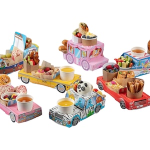 May include: A set of six colourful, cartoon-themed food trays, each with a different design. The trays feature a variety of snacks, including chips, fruit, and dips. The trays are perfect for children's parties or picnics.