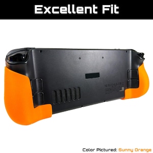 May include: Black handheld gaming device with sunny orange grips. The grips have a textured surface. The text "Excellent Fit" is at the top of the image. The color is described as "Sunny Orange".