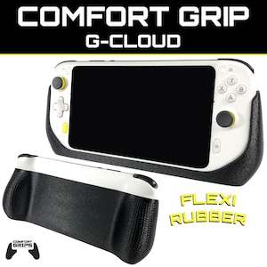 Puede incluir: Una consola de juegos portátil blanca y negra con un accesorio de agarre de goma negra. La consola tiene una pantalla negra y botones amarillos. El texto "COMFORT GRIP G-CLOUD" está impreso en la parte superior de la consola. El texto "FLEXI RUBBER" está impreso debajo de la consola.