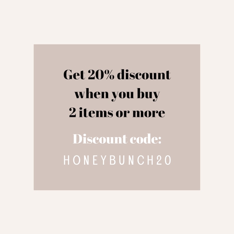 May include: A beige rectangle with black text that reads "Get 20% discount when you buy 2 items or more. Discount code: HONEYBUNCH20"