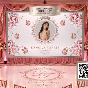 May include: A digital birthday slideshow display featuring a central circular portrait of a person, surrounded by pink floral illustrations, butterflies, and the text Dannica Torres Mis XV Años 07.11.26. The design includes a crown icon and a QR code.