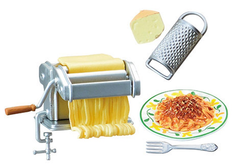 May include: A silver pasta maker with a wooden handle, a block of cheese, a grater, a plate of spaghetti with tomato sauce, and a silver fork.